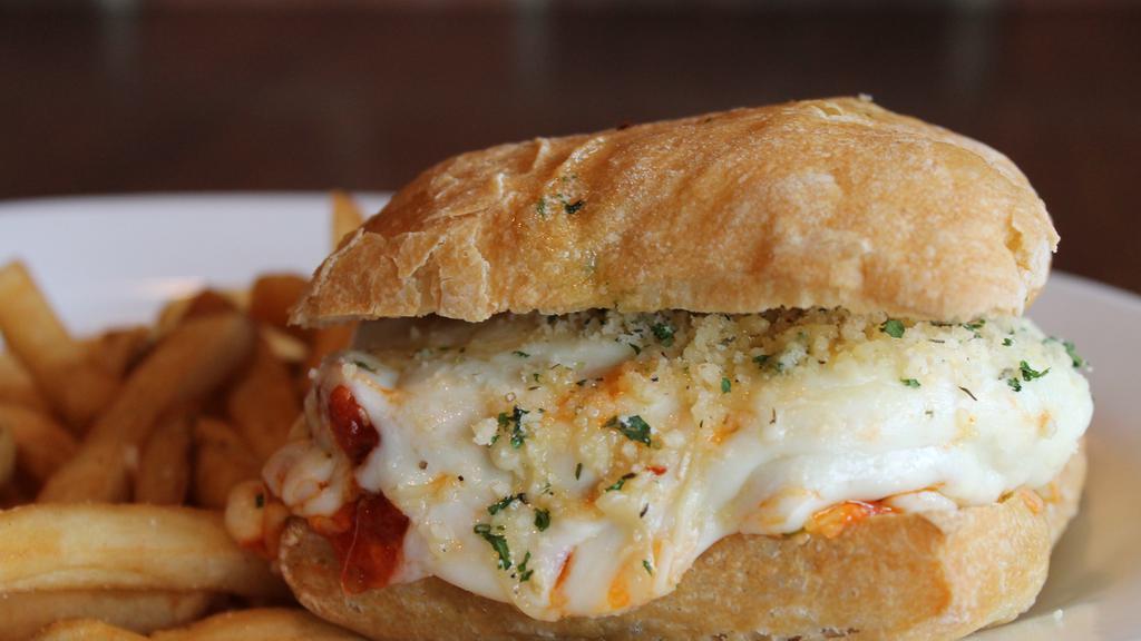 Chicken Parmesan Sandwich · Herb-parmesan breaded chicken topped with mozzarella, parmesan and zesty Italian tomato sauce. Served on ciabatta or an oat bran pita.