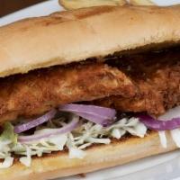 Coconut Chicken Hoagie · Coconut chicken tenders, cabbage and red onions topped with pomeray vinaigrette on a hoagie ...