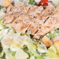 Grilled Chicken Caesar Salad · Gluten-friendly without croutons. Grilled chicken, romaine, homemade croutons, and grape tom...