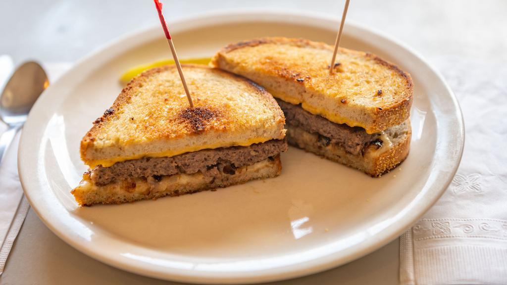Patty Melt  · beef patty with american, swiss cheese grilled onions