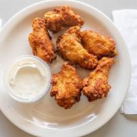 Wing Dings · These six meaty wings make a great starter.