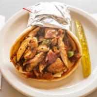 Johny'S Pita  · Marinated chicken breast with bacon, green peppers, onions swiss cheese