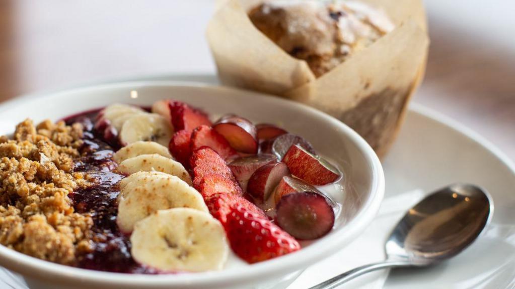 Berry Yogurt Bowl · Organic vanilla yogurt, sliced fruit, granola and a swirl of our homemade berry jam, served with a homemade muffin.