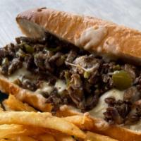 Beef Philly Cheesesteak · Thinly sliced steak cooked with mushrooms, onions, and green peppers and seasoned with our s...