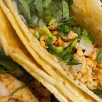 Street Tacos · 3 tacos . Fresh corn tortilla topped with onion and cilantro and your choice of meat.