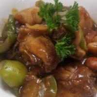 Brown Stew Chicken · Chicken stew in light browning sauce with slice potatoes, bell peppers, carrots, and onions.