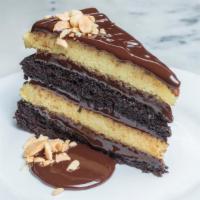 Chocolate Almond Cake · Toasted almonds and warm chocolate ganache.