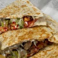 Hot Cheeto Quesadilla · Hot Cheeto Quesadilla comes with Cheese, your Meat Option, Sour Cream, Guacamole and Hot Che...