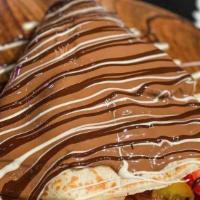 Rocky Road Crepe · Crepe filled with marshmallows topped with three kinds of Belgian Chocolate (Milk, Dark, and...