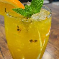 Passion Fruit Spritzer · Passion Fruit Juice mixed with japanese green tea.