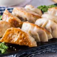 Chicken Dumplings · 8pcs chicken dumplings with sweet & sour soy sauce