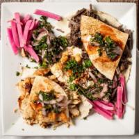 Meat Shawarma Plate · Tahini, pickled turnips, and parsley and onion mix. Served with pita bread, salad, and hummus.