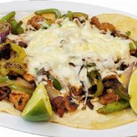 Alambres · 5 tortillas topped with your choice of meat, sautéed with bacon, green peppers, onions and t...