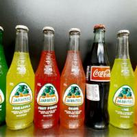 Bottled Soda · Jarritos:
Guava, Mango, Pineapple, Lime,  Fruit punch, Tamarind, Mandarin, Grapefruit.