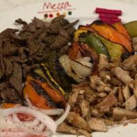 Shawarma Combo · Marinated charboiled meat & chicken.