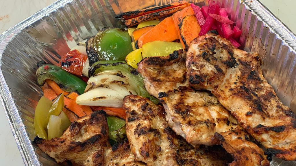 Whole Deboned Chicken Dark · Marinated in olive oil, garlic and light spices and char grilled.
