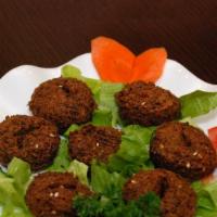 Falafel Plate · All-vegetable patties made of fava beans, chickpeas, onions, parsley, cilantro and special s...