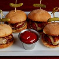 Tavern Style Sliders · Four mini beef burgers grilled then topped with bourbon red BBQ, melted smoked gouda, and cr...
