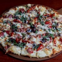 Tavern Brie Pizza · Artisan crust brushed with a brie spread. Topped with shaved prosciutto ham, fire roasted ar...