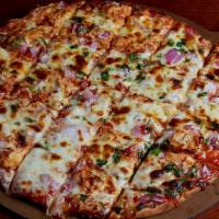 Bbq Chicken · Artisan crust brushed with bourbon red BBQ. Topped with pulled chicken breast, sweet red oni...