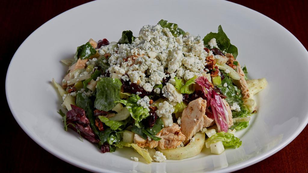Tavern'S Chop Salad · Chopped romaine and assorted spring greens tossed in honey lime dressing with grilled chicken, granny smith apples, cucumber, candied pecans, craisins, and bleu cheese crumbles.