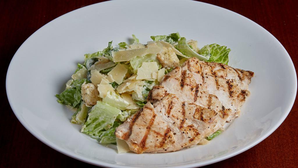 Caesar Salad · Romaine, Parmesan cheese, and garlic herb croutons with our signature Caesar dressing.