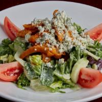 Buffalo Chicken Salad · Chopped romaine and assorted spring greens tossed in avocado ranch dressing with cucumber, d...
