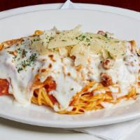 Baked Spaghetti · Italian sausage and pepperoni sautéed in olive oil then tossed with spaghetti in a blend of ...