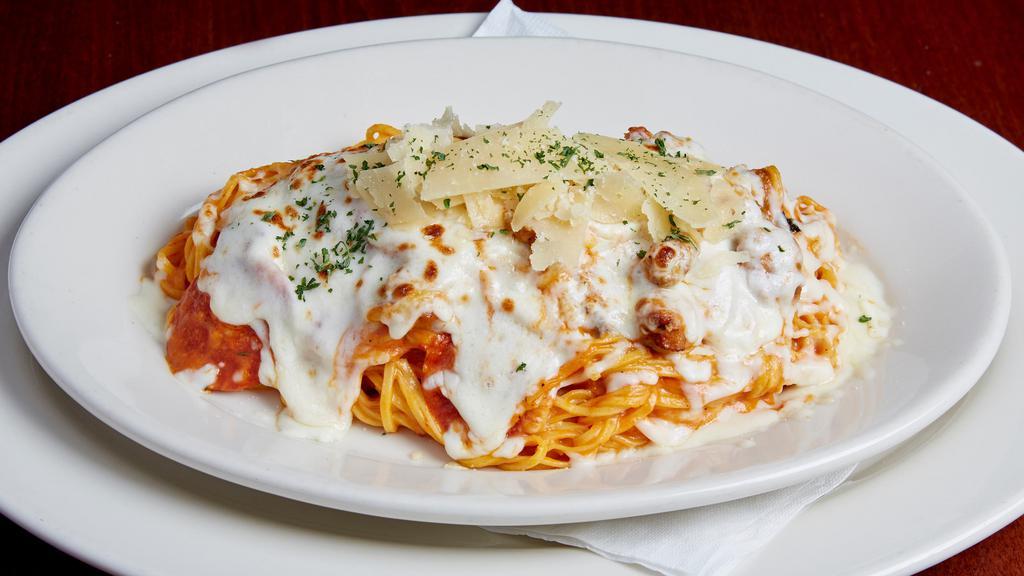 Baked Spaghetti · Italian sausage and pepperoni sautéed in olive oil then tossed with spaghetti in a blend of marinara and our creamy alfredo sauce. Topped with mozzarella cheese then baked. Garnished with parmesan cheese and parsley.