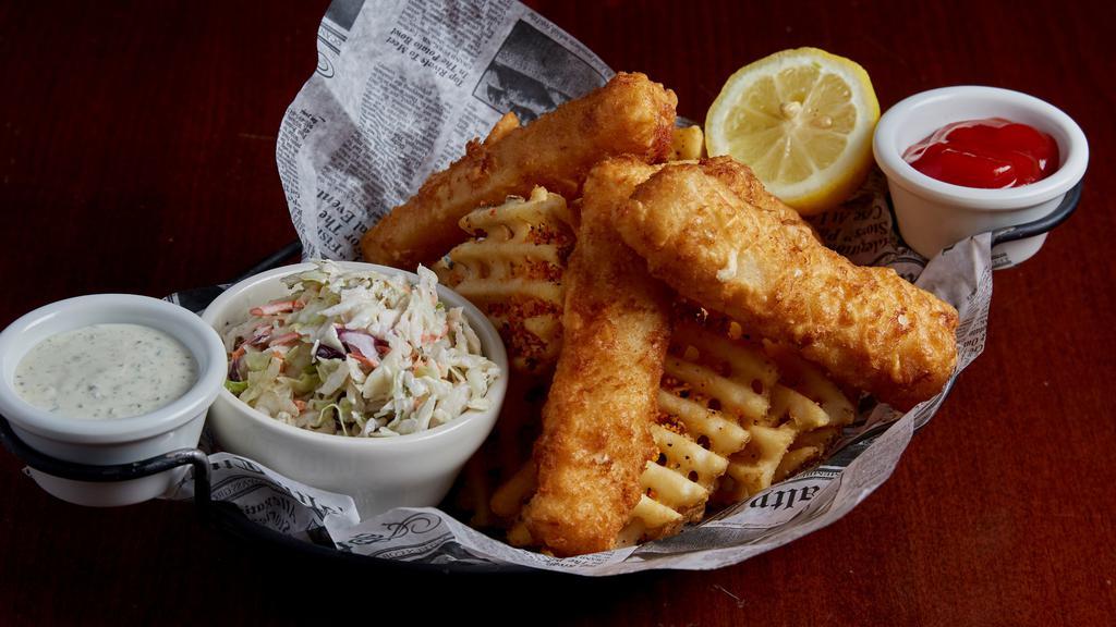 Tavern Fish & Chips · A generous portion of wild-caught filet of cod dipped in our tavern batter and lightly fried for a crispy crust. Served with waffle fries, house made coleslaw, and house made tartar sauce.