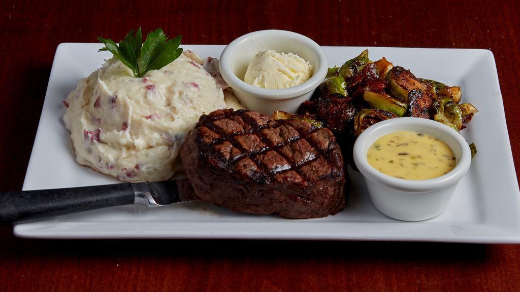 Naked Filet · Center cut eight oz. tenderloin of beef seasoned and grilled to perfection. Served with maple bacon brussels sprouts and a choice of garlic mashed potatoes or oven roasted rosemary potatoes. Accompanied with Tavern bearnaise sauce.