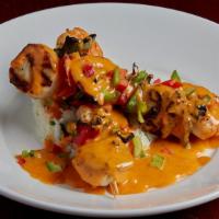 Grilled Shrimp & Scallop Skewer · Jumbo shrimp and scallops, skewered with fresh red onion, green pepper, and red pepper. Char...