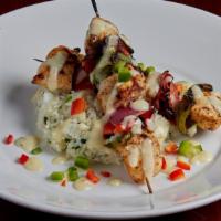 Chicken Skewers · Cilantro lime marinated chicken breast, skewered with fresh red onion, green pepper, and red...