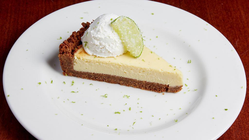 Key Lime Pie · House made key lime pie served with fresh whipped cream.