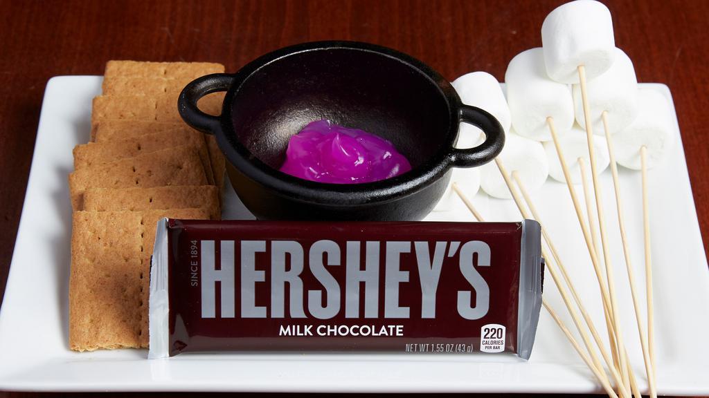 Build-Your-Own S'Mores · Toasted marshmallows, Hershey’s chocolate, and graham crackers.  Build Your Own at your table over your own personal campfire.