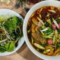  Bun Bo Danang · Spicy Beef Noodle Soup served with Asian greens