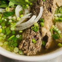 Pho Dac Biet · Rare steak, well-done brisket, sliced short-rib, beef meatballs served with bean sprouts, ba...