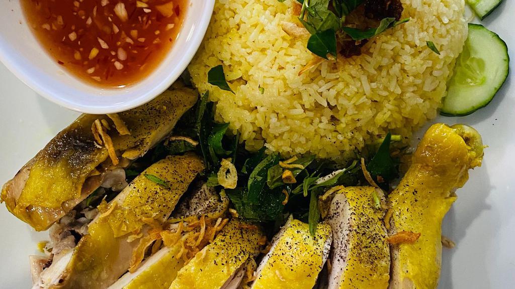 Com Ga Hai-Nam  · Braised chicken on yellow rice served with ginger fish sauce