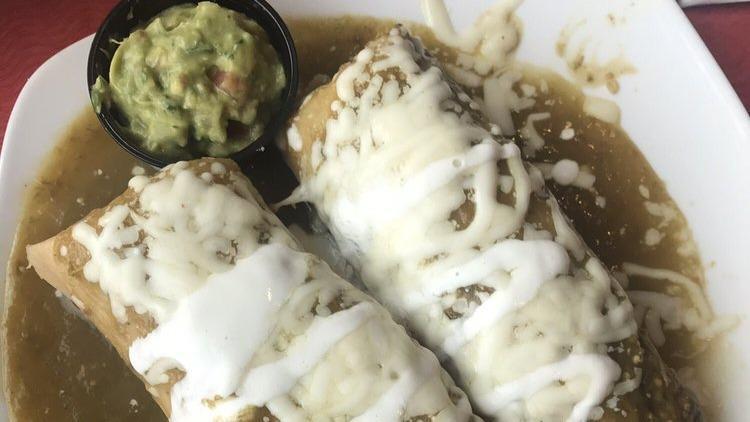 Tamales · Two chicken or pork tamales in green or red sauce, topped with mozzarella cheese and sour cream. Guacamole on the side.