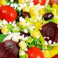 Greek Salad (Medium) · Romaine lettuce, tomatoes, feta cheese, beets, kalamata olives, onions, pepperoncini, and Gr...