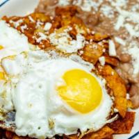 Chilaquiles · Includes 2 eggs, beans, green or red salsa.