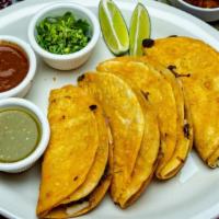 4 Birria Tacos · With consome.
