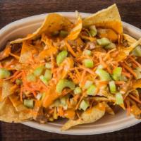 Buffalo Chicken Nachos · topped with Mexican Cheese, celery & carrots