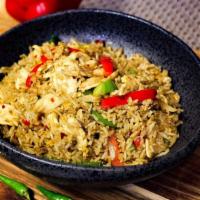Spicy Fried Rice · Spicy stir-fried rice, sweet basil, fresh garlic, chili, onions, egg and bell peppers