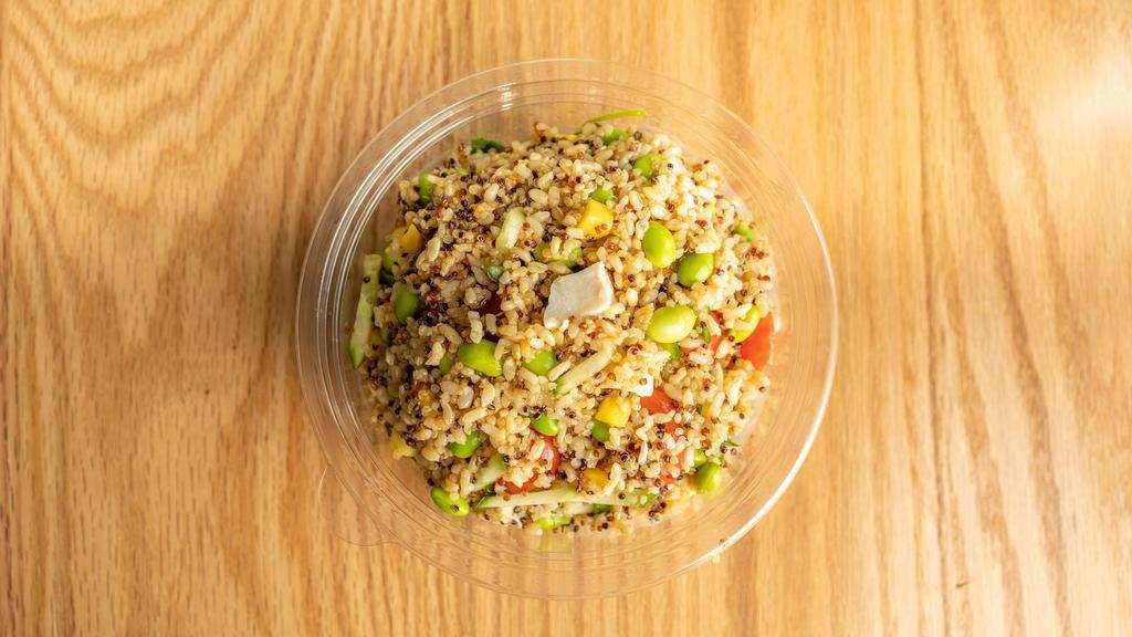 Quinoa Salad · Quinoa, brown rice, and chicken mixed with tomato, mango, cilantro, cucumber, edamame, ponzu sauce and lemon ginger. *Item is sold as is, no substitutions or modifications allowed. *.