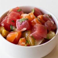 Ahi Poke (Marinated Tuna) · Traditional Ahi Poke, Onions, Hawaiian Sea Salt, Sesame Oil, Shoyu (only Poke, no base, topp...