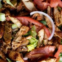 Chicken Shawarma Salad · Grilled marinated chicken breast, lettuce, tomato, pita chips, onions, cucumber and peppers....