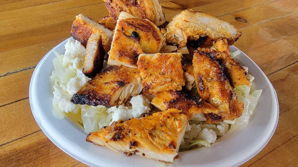Niki Salad · Cabbage, feta, and grilled marinated chicken breast. Served tossed in house dressing.