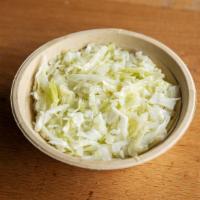 Cabbage Salad · Shredded cabbage served with house dressing.