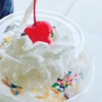 Super Fruity Man Sundae · Two scoops of Superman, fruity pebbles and ice cold milk. Topped with whipped cream and a ch...